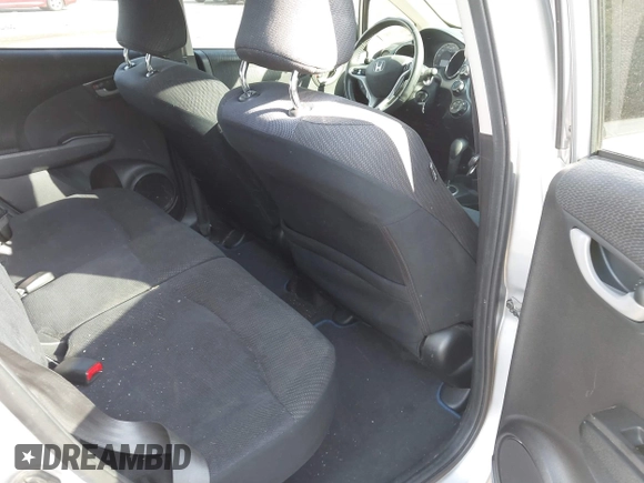 2013 Honda Fit Sport z VIN JHMGE8H69DC033802, wystawiony jako IAAI lot #42149500 z przebiegiem 144 980 mil mil oraz . Historia ofert i sprzedaży dostępna na DreamBid. Obrazek 8.