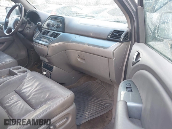 2010 Honda Odyssey EX-L with VIN 5FNRL3H70AB027137, listed as a IAAI auction lot 41659981 with 202,256 mi miles and . Bid and sale history available at DreamBid. Image 5.