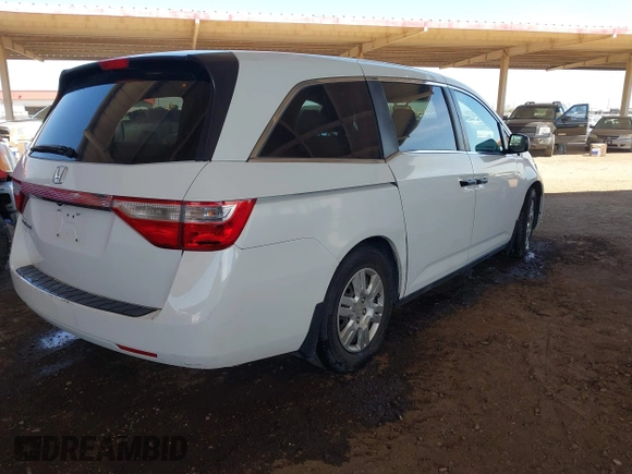 2013 Honda Odyssey LX with VIN 5FNRL5H2XDB028879, listed as a IAAI auction lot 41958988 with 49,868 mi miles and . Bid and sale history available at carsss.com. Image 4.