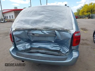 2005 Dodge Caravan SXT with VIN 2D4GP44L75R193138, listed as a IAAI auction lot 42073429 with 206,915 mi miles and . Bid and sale history available at DreamBid. Image 6.