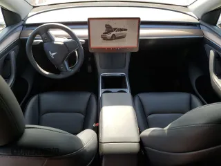 2024 Tesla Model Y Long Range с VIN 7SAYGDEE8RF983067, выставлен на аукционе Copart как лот 61217015 с пробегом 57 082 миль миль и Списание • Salvage title. История ставок и продаж доступна на DreamBid. Изображение 8.