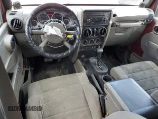 2007 Jeep Wrangler Unlimited Sahara with VIN 1J4GA591X7L118192, listed as a Copart auction lot 62357885 with 261,019 mi miles and Clean title. Bid and sale history available at DreamBid. Image 8.