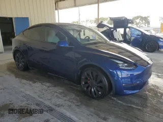 2023 Tesla Model Y Performance with VIN 7SAYGDEF1PF865688, listed as a Copart auction lot 44924385 with 19,255 mi miles and Non Repairable. Bid and sale history available at DreamBid. Image 4.