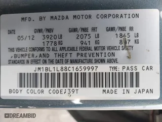 2012 Mazda Mazda3 i Touring with VIN JM1BL1L88C1659997, listed as a IAAI auction lot 41985367 with 235,081 mi miles. Bid and sale history available at carsss.com. Image 9.