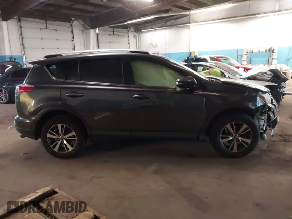 2018 Toyota RAV4 XLE with VIN JTMRFREV8JJ208377, listed as a IAAI auction lot 41629369 with 160,870 mi miles. Bid and sale history available at carsss.com. Image 13.