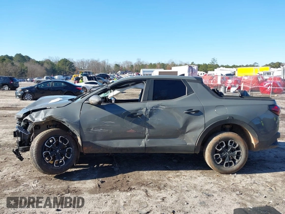 2022 Hyundai Santa Cruz SEL with VIN 5NTJB4AE7NH014148, listed as a IAAI auction lot 41263713 with 70,619 mi miles and . Bid and sale history available at DreamBid. Image 14.