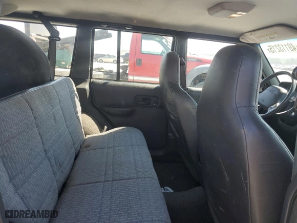 2001 Jeep Cherokee Sport with VIN 1J4FF48S71L574658, listed as a Copart auction lot 49113215 with 208,626 mi miles and Salvage Title. Bid and sale history available at carsss.com. Image 10.