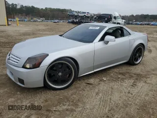 2005 Cadillac XLR z VIN 1G6YV34AX55603706, wystawiony jako Copart lot #81643824 z przebiegiem 84 951 mil mil oraz Tytuł czysty. Historia ofert i sprzedaży dostępna na DreamBid. Obrazek 1.