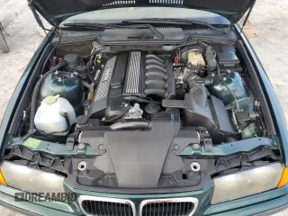 1999 BMW 3 Series z VIN WBABK8330XEY91814, wystawiony jako Copart lot #79799074 z przebiegiem 63 783 mil mil oraz Szkoda całkowita • Salvage title. Historia ofert i sprzedaży dostępna na DreamBid. Obrazek 11.