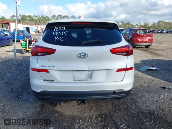 2019 Hyundai Tucson SE with VIN KM8J2CA48KU951829, listed as a IAAI auction lot 41261166 with 100,533 mi miles. Bid and sale history available at carsss.com. Image 16.