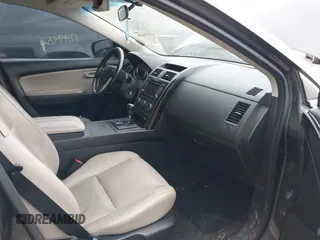 2015 Mazda CX-9 Touring with VIN JM3TB2CA5F0452775, listed as a IAAI auction lot 42659258 with 129,948 mi miles and . Bid and sale history available at DreamBid. Image 5.