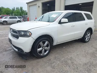 2012 Dodge Durango SXT with VIN 1C4RDHAG0CC121748, listed as a IAAI auction lot 42122731 with 220,611 mi miles and . Bid and sale history available at carsss.com. Image 2.