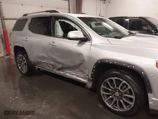 2020 GMC Acadia Denali with VIN 1GKKNXLS9LZ215459, listed as a IAAI auction lot 40815587 with 58,389 mi miles. Bid and sale history available at carsss.com. Image 6.