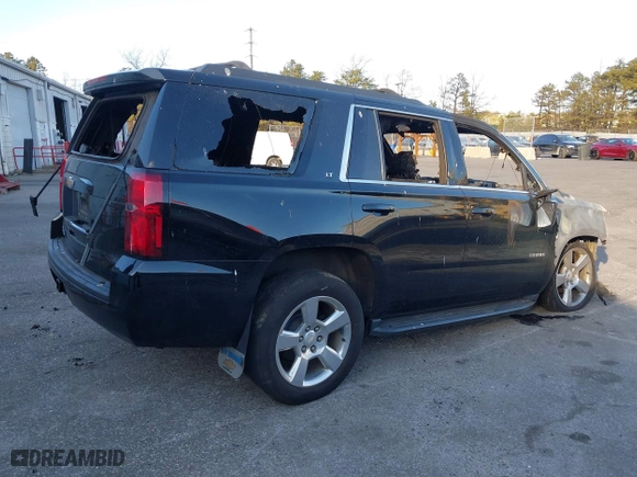2019 Chevrolet Tahoe LT with VIN 1GNSKBKC3KR284087, listed as a IAAI auction lot 41345856 with 70,394 mi miles. Bid and sale history available at carsss.com. Image 4.