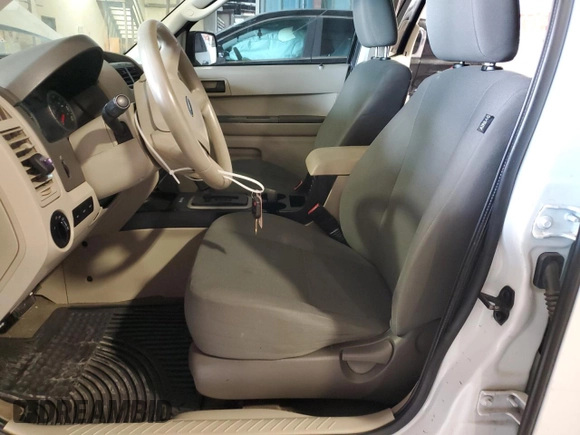 2011 Ford Escape XLS с VIN 1FMCU0C78BKC53371, выставлен на аукционе Copart как лот 54767005 с пробегом 227 192 миль миль и Списание • Salvage title. История ставок и продаж доступна на DreamBid. Изображение 7.