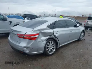2013 Toyota Avalon XLE z VIN 4T1BK1EB2DU044501, wystawiony jako IAAI lot #41905442 z przebiegiem 97 169 mil mil oraz . Historia ofert i sprzedaży dostępna na DreamBid. Obrazek 4.