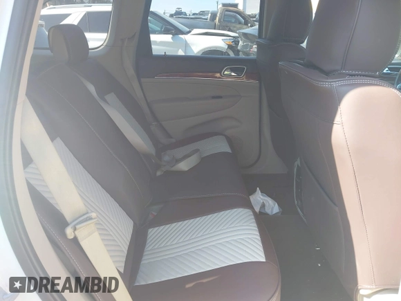 2011 Jeep Grand Cherokee Overland Summit with VIN 1J4RR6GT9BC546825, listed as a IAAI auction lot 42118789 with 123,449 mi miles. Bid and sale history available at carsss.com. Image 8.