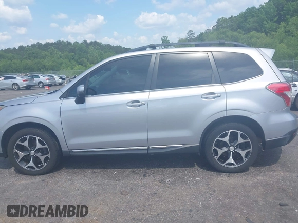 2015 Subaru Forester XT Touring z VIN JF2SJGUC4FH449213, wystawiony jako IAAI lot #42128074 z przebiegiem 112 373 mil mil oraz . Historia ofert i sprzedaży dostępna na DreamBid. Obrazek 14.