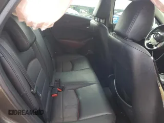 2017 Mazda CX-3 Touring z VIN JM1DKDC71H0172044, wystawiony jako Copart lot #56465125 z przebiegiem 119 374 mil mil oraz Szkoda całkowita • Salvage title. Historia ofert i sprzedaży dostępna na DreamBid. Obrazek 10.