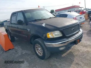 2001 Ford F-150 XLT with VIN 1FTRW08L61KD90032, listed as a IAAI auction lot 42385610 with 164,252 mi miles and . Bid and sale history available at DreamBid. Image 1.