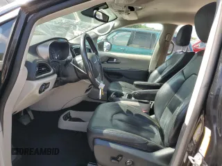 2020 Chrysler Pacifica Touring L with VIN 2C4RC1BG8LR133548, listed as a Copart auction lot 63272655 with 64,489 mi miles and Salvage title. Bid and sale history available at DreamBid. Image 7.