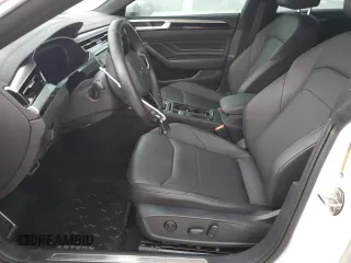 2023 Volkswagen Arteon SEL R-Line z VIN WVWSR7ANXPE013112, wystawiony jako Copart lot #74192954 z przebiegiem Nie podano mil oraz Szkoda całkowita • Salvage title. Historia ofert i sprzedaży dostępna na DreamBid. Obrazek 7.