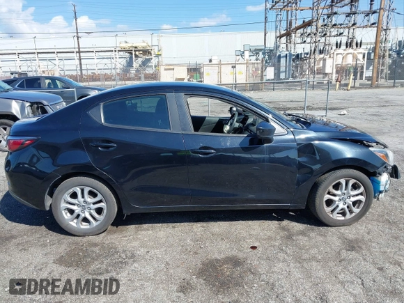 2016 Scion iA z VIN 3MYDLBZV0GY123351, wystawiony jako IAAI lot #41736327 z przebiegiem 86 804 mil mil oraz . Historia ofert i sprzedaży dostępna na DreamBid. Obrazek 13.