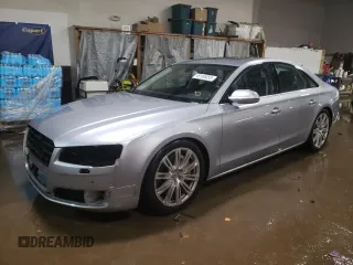 2015 Audi A8 z VIN WAUJGAFD1FN011100, wystawiony jako Copart lot #49166055 z przebiegiem 38 575 mil mil oraz Szkoda całkowita • Salvage title. Historia ofert i sprzedaży dostępna na DreamBid. Obrazek 1.