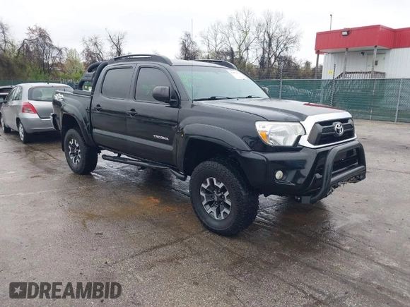 2015 Toyota Tacoma with VIN 3TMLU4ENXFM185371, listed as a IAAI auction lot 41952513 with 87,128 mi miles and . Bid and sale history available at DreamBid. Image 1.