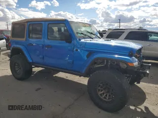 2021 Jeep Wrangler Unlimited Sahara High Altitude with VIN 1C4HJXEM3MW770622, listed as a Copart auction lot 76144874 with 71,886 mi miles and Salvage title. Bid and sale history available at DreamBid. Image 4.