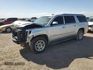 2015 Chevrolet Suburban LT z VIN 1GNSCJKC1FR517638, wystawiony jako Copart lot #52765165 z przebiegiem 178 362 mil mil oraz Czysty tytuł • Clean title. Historia ofert i sprzedaży dostępna na DreamBid. Obrazek 1.