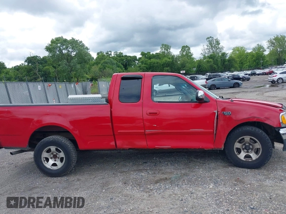 2002 Ford F-150 XL with VIN 2FTRX17222CA63516, listed as a IAAI auction lot 42326767 with 206,181 mi miles and . Bid and sale history available at DreamBid. Image 13.