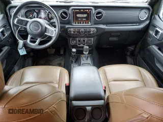 2023 Jeep Wrangler Sahara with VIN 1C4JJXP61PW528948, listed as a Copart auction lot 46866885 with 38,191 mi miles and Clean Title. Bid and sale history available at DreamBid. Image 8.