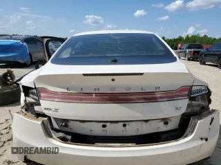 2013 Lincoln MKZ z VIN 3LN6L2GK2DR823745, wystawiony jako Copart lot #54887275 z przebiegiem 163 267 mil mil oraz Szkoda całkowita • Salvage title. Historia ofert i sprzedaży dostępna na DreamBid. Obrazek 6.
