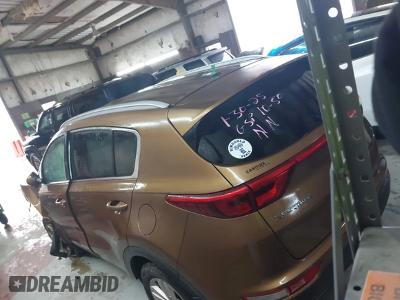 2018 Kia Sportage LX with VIN KNDPMCACXJ7446520, listed as a IAAI auction lot 41568985 with 79,601 mi miles and . Bid and sale history available at DreamBid. Image 3.