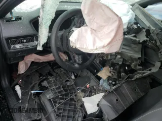 2025 Honda Civic Sport z VIN 2HGFE2F50SH568680, wystawiony jako Copart lot #54126165 z przebiegiem Nie podano mil oraz Szkoda całkowita • Salvage title. Historia ofert i sprzedaży dostępna na DreamBid. Obrazek 8.