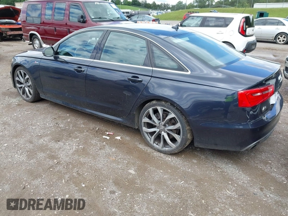 2013 Audi A6 Prestige with VIN WAUJGAFC1DN050046, listed as a IAAI auction lot 42364591 with 101,377 mi miles and . Bid and sale history available at DreamBid. Image 3.