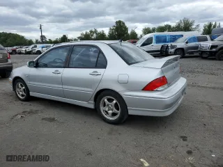 2003 Mitsubishi Lancer OZ-Rally with VIN JA3AJ86E23U031703, listed as a Copart auction lot 67078494 with 174,053 mi miles and Salvage Title. Bid and sale history available at carsss.com. Image 2.