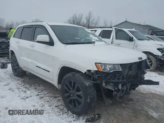 2018 Jeep Grand Cherokee Laredo E with VIN 1C4RJFAG1JC499457, listed as a IAAI auction lot 41379459 with 127,344 mi miles and . Bid and sale history available at DreamBid. Image 1.
