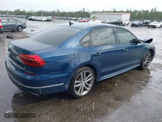 2018 Volkswagen Passat 2.0T S with VIN 1VWAA7A30JC021740, listed as a IAAI auction lot 41887035 with 65,227 mi miles. Bid and sale history available at carsss.com. Image 4.
