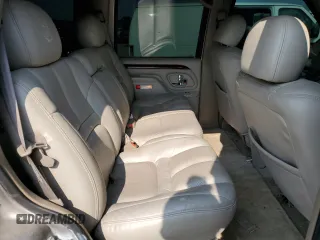 2000 Cadillac Escalade z VIN 1GYEK63R2YR210601, wystawiony jako Copart lot #64108944 z przebiegiem 186 964 mil mil oraz Szkody całkowita. Historia ofert i sprzedaży dostępna na DreamBid. Obrazek 11.