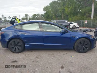 2025 Tesla Model 3 Long Range with VIN 5YJ3E1EA2SF919461, listed as a IAAI auction lot 41672494 with 777 mi miles and . Bid and sale history available at DreamBid. Image 13.