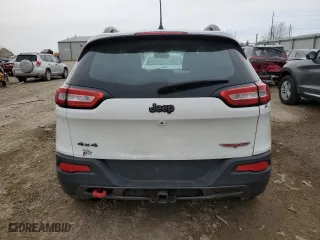 2016 Jeep Cherokee Trailhawk with VIN 1C4PJMBB8GW304993, listed as a Copart auction lot 48041855 with 131,787 mi miles and Clean Title. Bid and sale history available at carsss.com. Image 6.