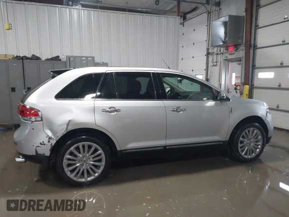2014 Lincoln MKX with VIN 2LMDJ8JK7EBL16661, listed as a IAAI auction lot 41595967 with 77,868 mi miles. Bid and sale history available at carsss.com. Image 14.