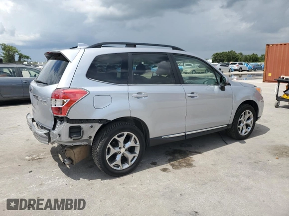 2016 Subaru Forester Touring with VIN JF2SJAXC7GH415762, listed as a Copart auction lot 63473555 with 74,570 mi miles and Salvage title. Bid and sale history available at DreamBid. Image 3.