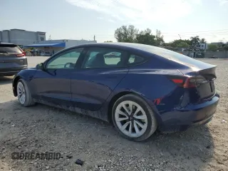 2023 Tesla Model 3 z VIN 5YJ3E1EA3PF434205, wystawiony jako Copart lot #57917305 z przebiegiem 82 481 mil mil oraz Szkody całkowita. Historia ofert i sprzedaży dostępna na DreamBid. Obrazek 2.