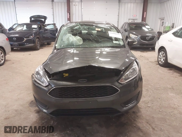 2018 Ford Focus SE with VIN 1FADP3F22JL298144, listed as a IAAI auction lot 41880555 with 73,166 mi miles. Bid and sale history available at carsss.com. Image 12.