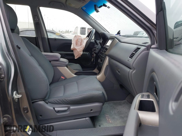 2007 Honda Pilot LX with VIN 5FNYF281X7B006877, listed as a IAAI auction lot 41595667 with 255,799 mi miles. Bid and sale history available at carsss.com. Image 5.