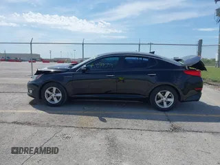 2015 Kia Optima LX with VIN 5XXGM4A79FG394563, listed as a IAAI auction lot 42077359 with 115,124 mi miles and . Bid and sale history available at DreamBid. Image 14.