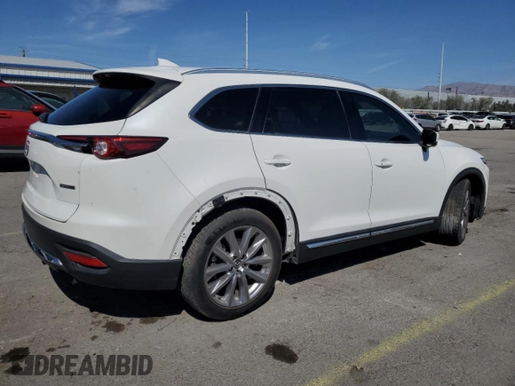 2021 Mazda CX-9 Carbon Edition с VIN JM3TCADY4M0500010, выставлен на аукционе Copart как лот 53283005 с пробегом 55 762 миль миль и Списание • Salvage title. История ставок и продаж доступна на DreamBid. Изображение 3.